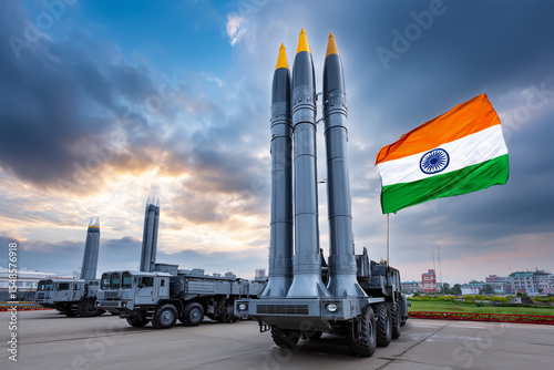 Indian Military Vehicle with Missile Launcher and National Flag Against Dramatic Sky Displaying Strength and Technological Prowess