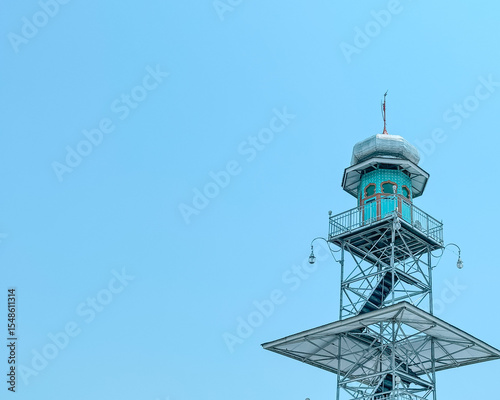 The tower of Demak Great Mosque with cloudy sky background. 