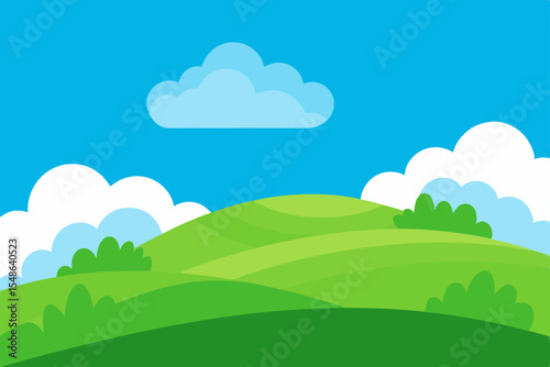 Mountain landscape with green summer field under a blue sky