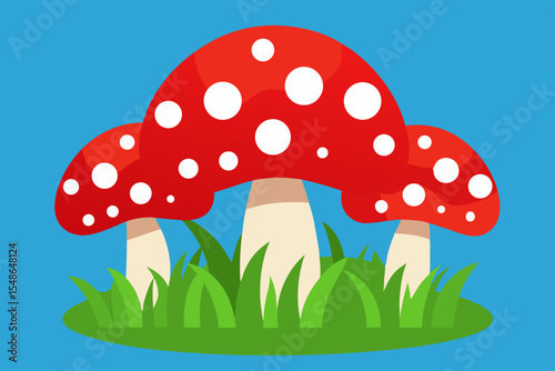 Enchanted Forest A Trio of Red Toadstools in Lush Green Grass