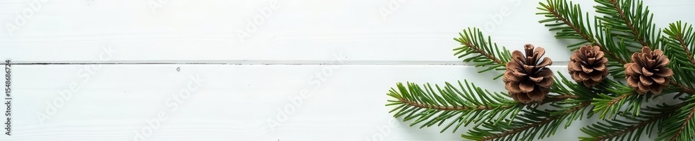 Simple white & wood Christmas tree with pine cones, natural garland, aesthetic, texture Simple white & wood Christmas tree with pine cones, natural garland, aesthetic, texture