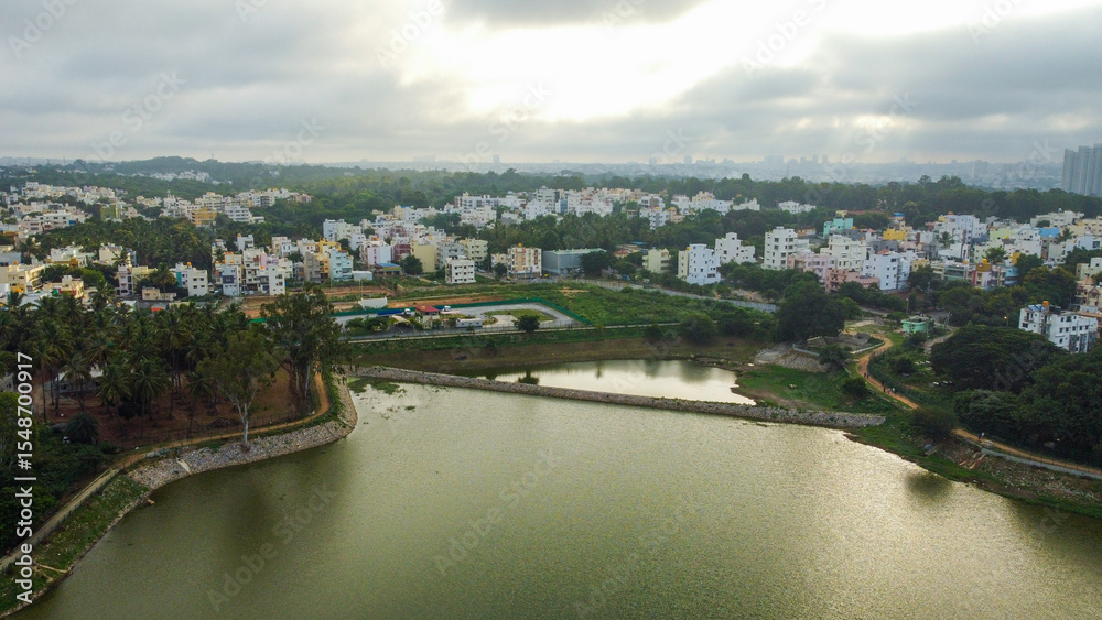 Fototapeta premium 4K Drone View of Kengeri, a Bustling Suburb of Bangalore | Mysore Road, Kengeri Satellite Town, Jnanabharathi Layout, Valgerahalli, Rajarajeshwari Nagar, Urban Expansion in South India