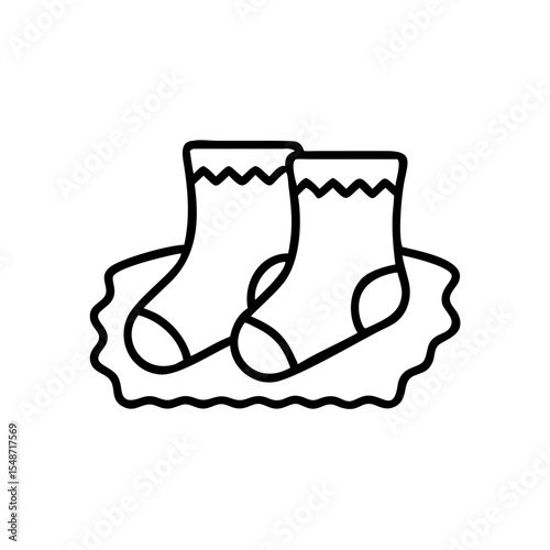 Cozy winter socks on fluffy rug, holiday warmth indoors