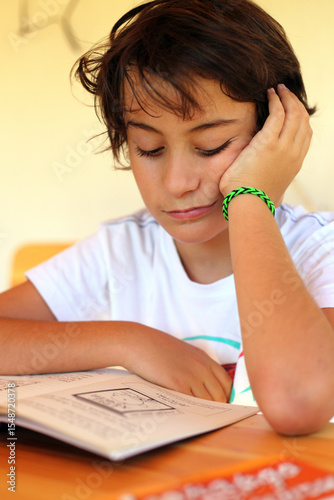  boy reads lessons