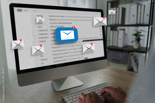 man reading e-mail on smartphone email inbox and email with laptop on internet information from spam mail