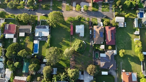Ellen Grove, Brisbane, Queensland, Australia: 4K Aerial Image of Low Density Housing with Solar, Tree Lined Streets, Suburban Layout, Residential Zone, and Urban Green Space in Brisbane Western
