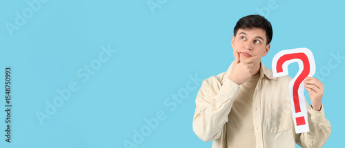 Thoughtful young man with p...