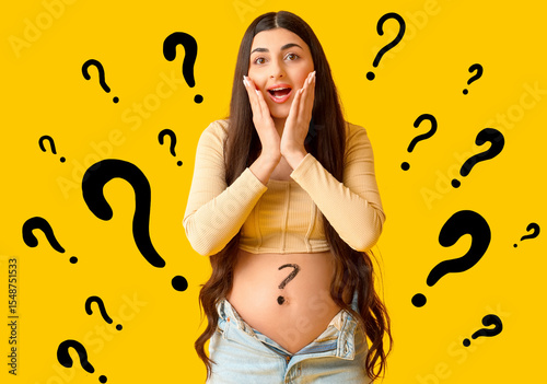 Shocked young pregnant woma...
