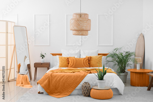 Interior of light bedroom w...