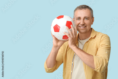Handsome mature man playing...
