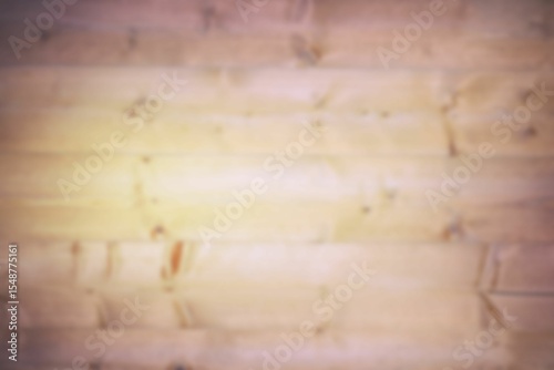 Flat design interior wooden plank wall is showing natural grain patterns and knots in soft focus