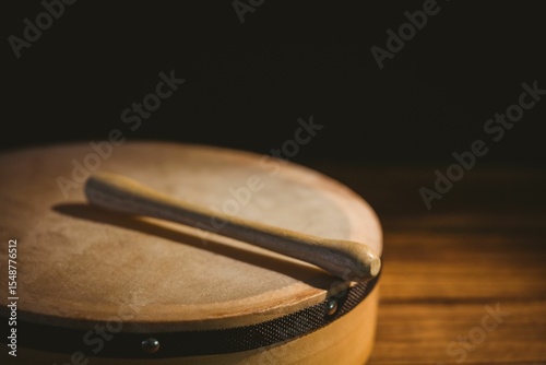 Close-up of wooden stick on bodhran