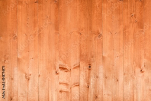 Smooth wooden plank surface is featuring flat design with sheen, warm brown grain patterns and kno