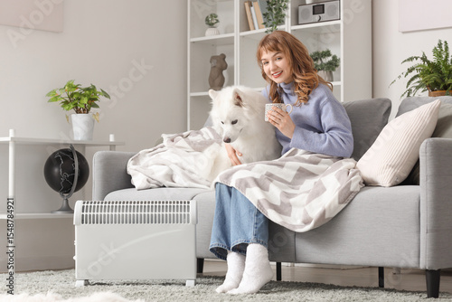 Young woman with Samoyed do...