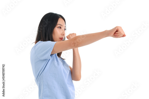 Young Asian woman practicin...