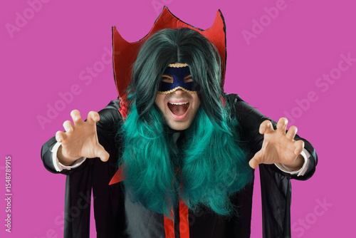 Happy young man in vampire ...