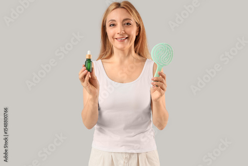 Mature woman with serum for...