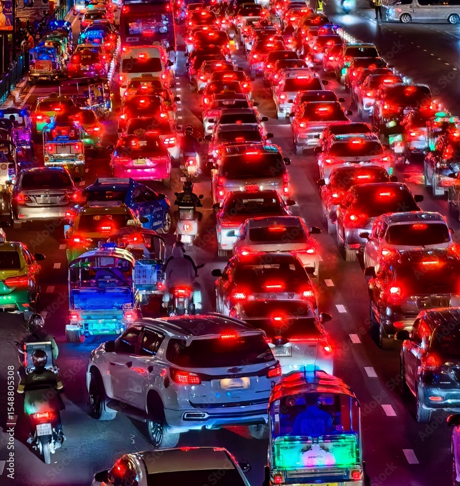 Fototapeta premium Heavy Traffic Jam at Night with Red Tail Lights