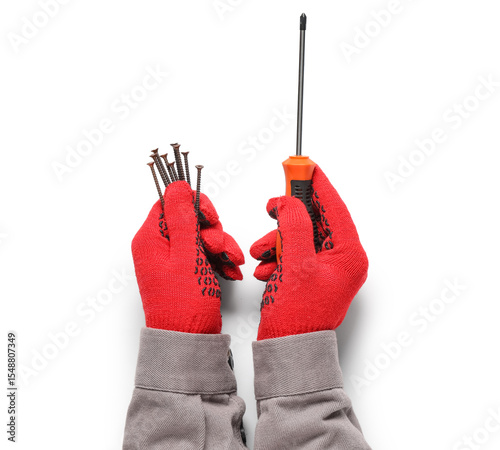 Worker's hands holding scre...