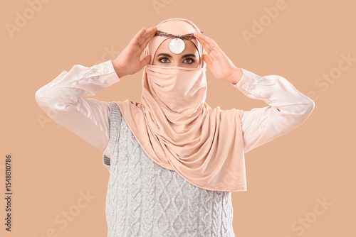 Beautiful Muslim woman in h...