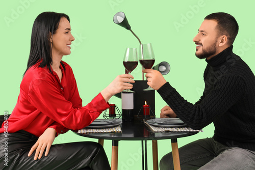 Young couple with wine at r...