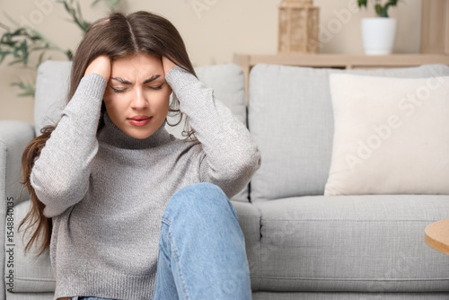 Young woman having panic at...