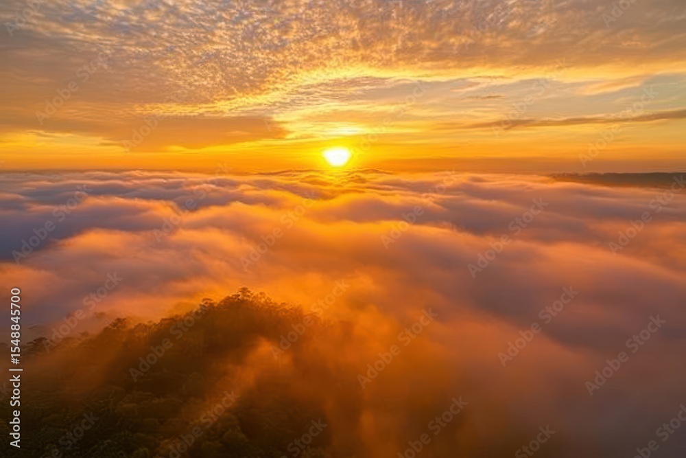 Obraz premium Sunrise over misty mountains
