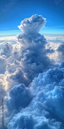 Breathtaking Cumulus Clouds in Portrait Orientation against a Clear Blue Sky with Ample Copy Space