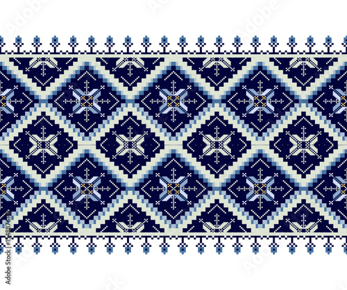  Traditional tribal style cross stitch pattern with blue diamond shapes and floral motifs.