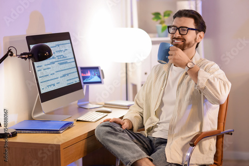 Handsome programmer with cu...