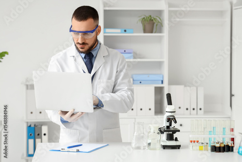Male scientist working with...
