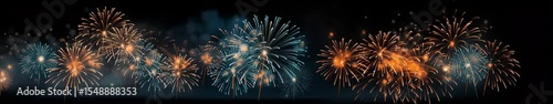 Widescreen fireworks exploding across the night sky in stunning panoramic display

