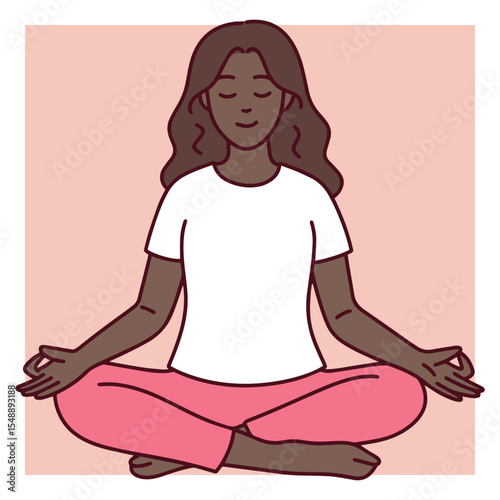 Young dark skinned woman sits in lotus pose with eyes closed, practicing meditation and mindfulness in calm and peaceful setting