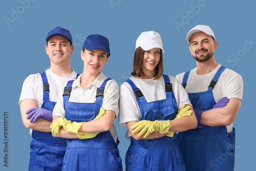 Team of young janitors on b...