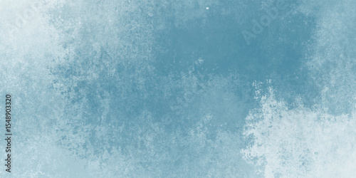 Abstract cloudy texture in faded blue watercolor style

