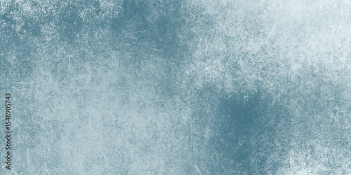 Blue abstract wall texture with faded grunge brushwork

