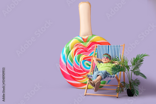 Cute little boy sitting in ...