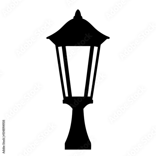 Silhouette of an old fashioned street lamp post with a classic design