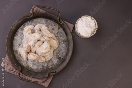 Kue Putri Salju Kacang Mede or Snow Princess White Cookies with Cashew, Cookie to Celebrate Eid al Fitr.