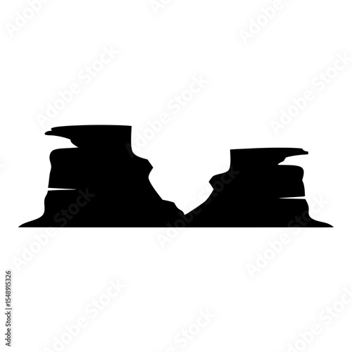A Black and White Silhouette of Two Rock Formations in the Desert