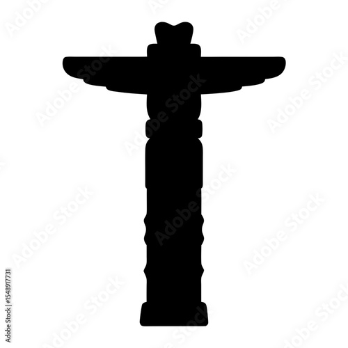 Black silhouette of a north American Totem pole against white backdrop