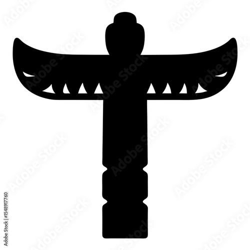 Silhouette of totem pole with winglike features, tribal art and culture