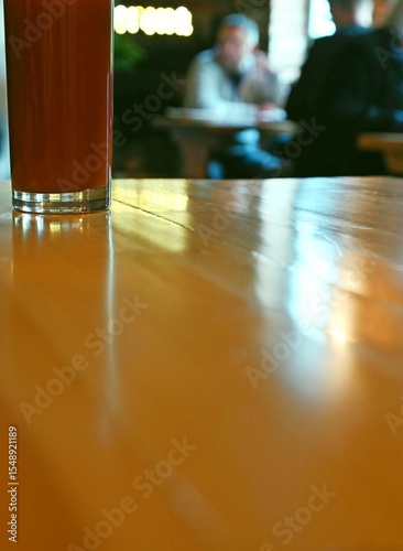 Glass on a table in a cafe.