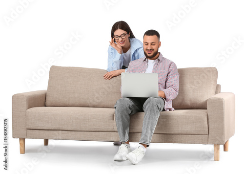 Young couple using laptop o...