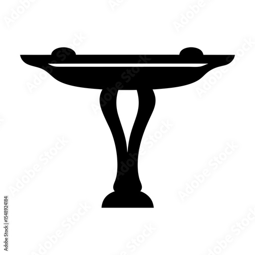 Silhouette of ornate pedestal dish with decorative spheres and curving support structure