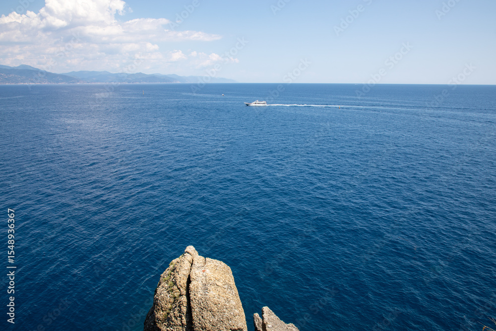boat on the coast como lake in italy north with mountain background boat on the coast como lake in italy north with mountain background