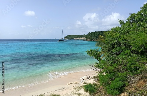Plage moustique, anse de Mays, or mosquito beach in Saint Louis, Marie Galante, Guadeloupe : idyllic deserted beach with bright sand and clear turquoise sea water