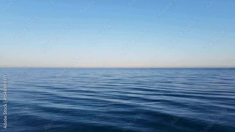 Calm Blue Ocean Water Under Clear Light Blue Sky Horizon Nature Landscape Calm Blue Ocean Water Under Clear Light Blue Sky Horizon Nature Landscape