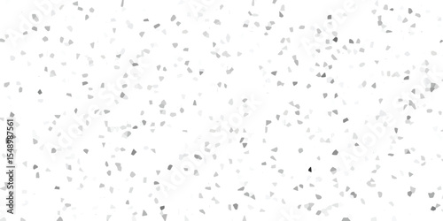 Abstract mosaic pattern background composed of varied tones of gray geometric shapes and fragments scattered across a white backdrop