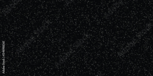 Textured black surface resembling sand or gravel offering a dark and granular appearance for various design applications.